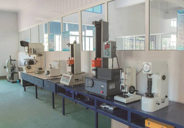 Custom Springs 29 Spring testing instruments on an inspection bench (Zigoal)
